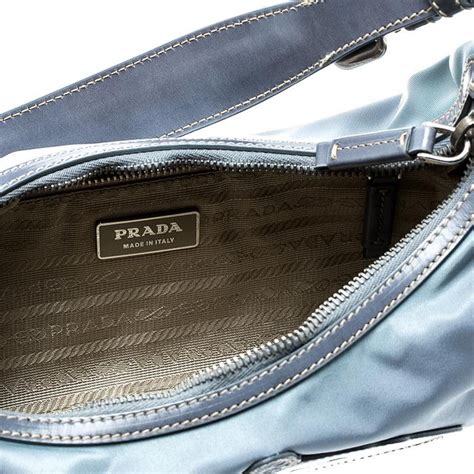 light blue prada handbag|blue Prada nylon bag.